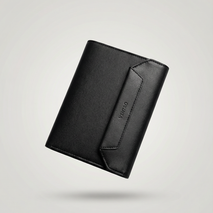 Black leather wallet on a light gray background