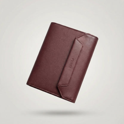 Brown leather wallet on a light gray background
