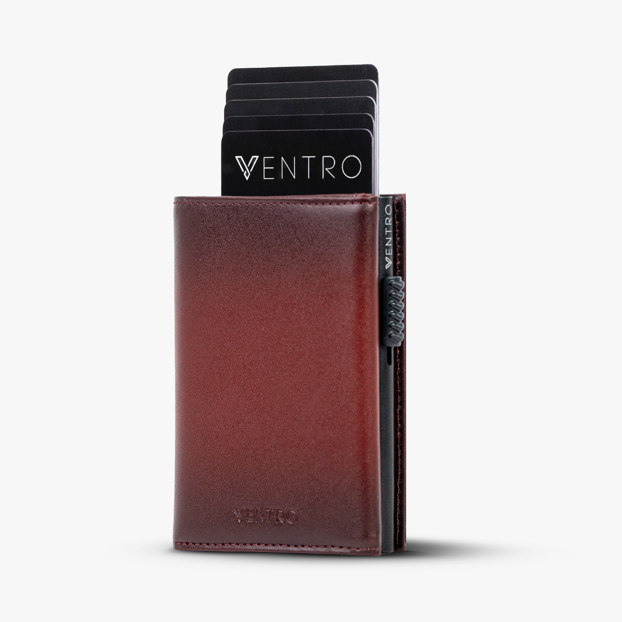 Brown leather cardholder with Ventro branding on a white background. Red mirage ventro nfc wallet